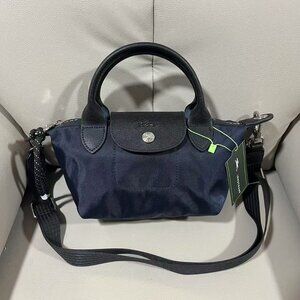 Authentic Longchamp navy blue crossbody bag.
